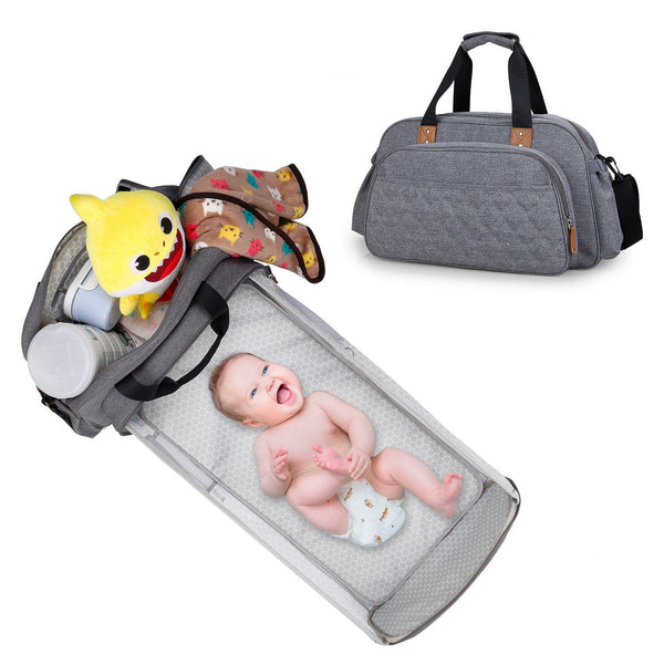 Versatile diaper bag converts into a baby bed and changing table